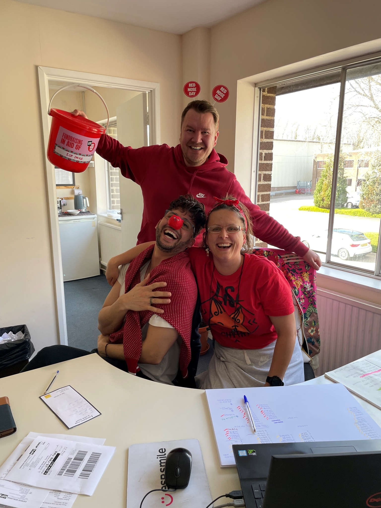 Team fundraising for Red Nose Day charity